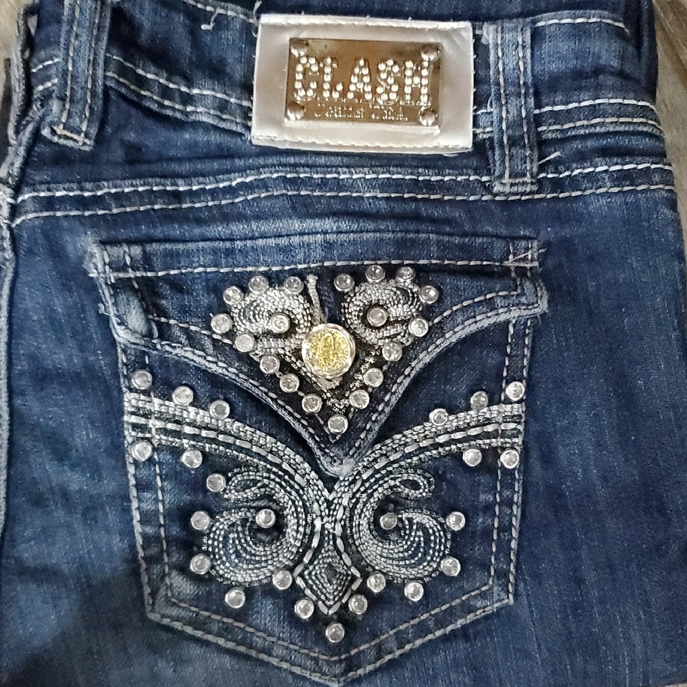 Stylish Blue Jeans with Silver and Gold Accents